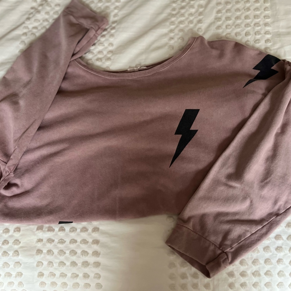 Pink sweatshirt with lightning bolts!